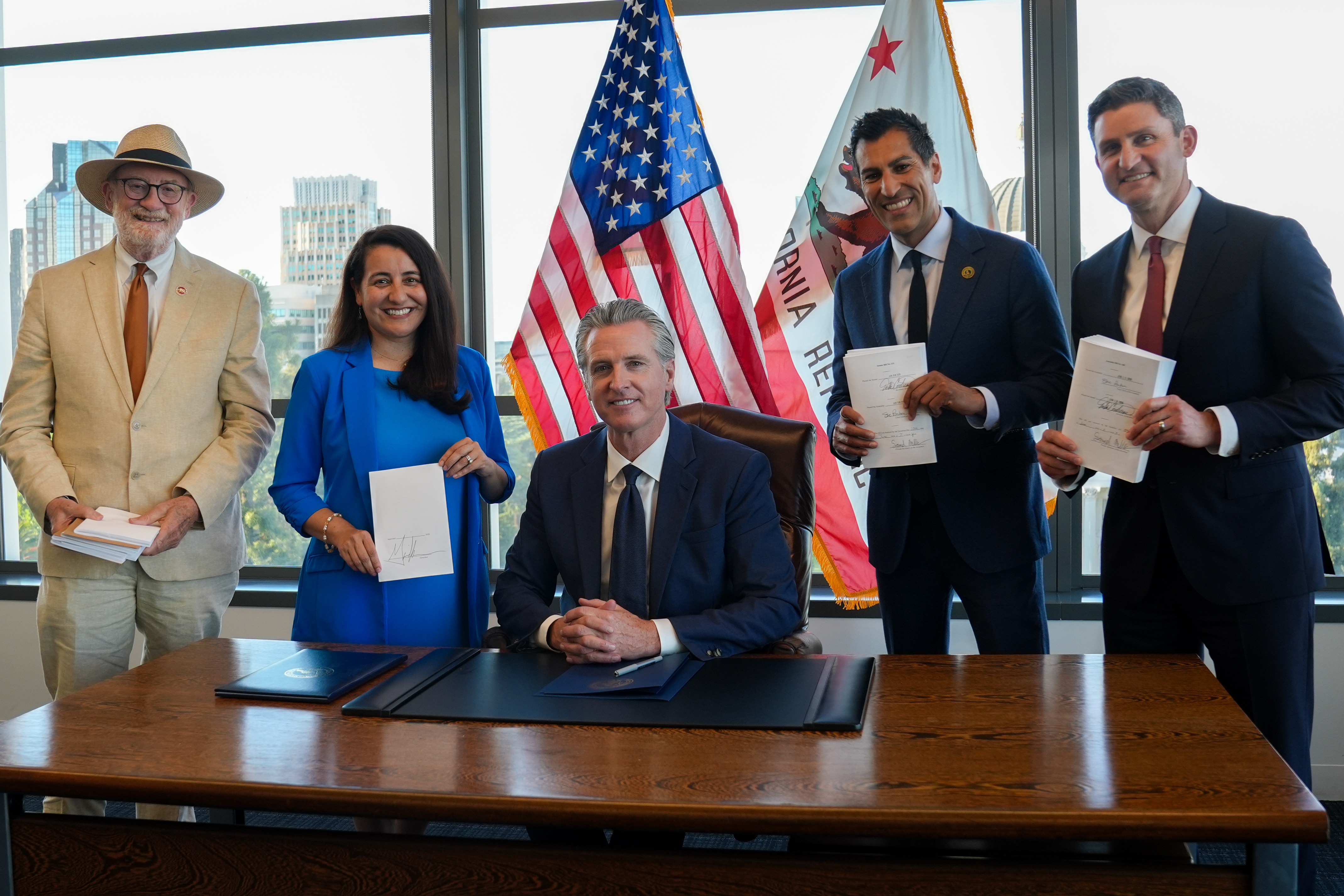Governor Newsom holds budget bill with Pro Tem Limon and budget chairs