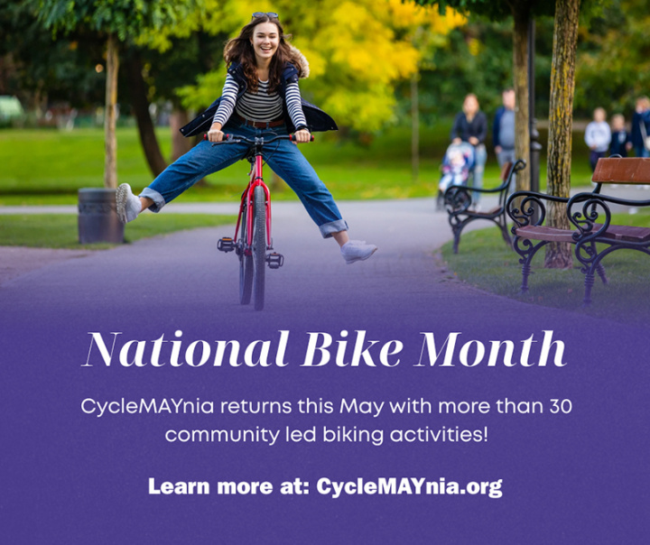 Girl riding red bike to promote National Bike Month